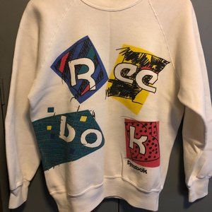 VINTAGE REEBOK LARGE LOGO JAZZ 80S BRITISH USA MADE WHITE COLORFUL SWEATER